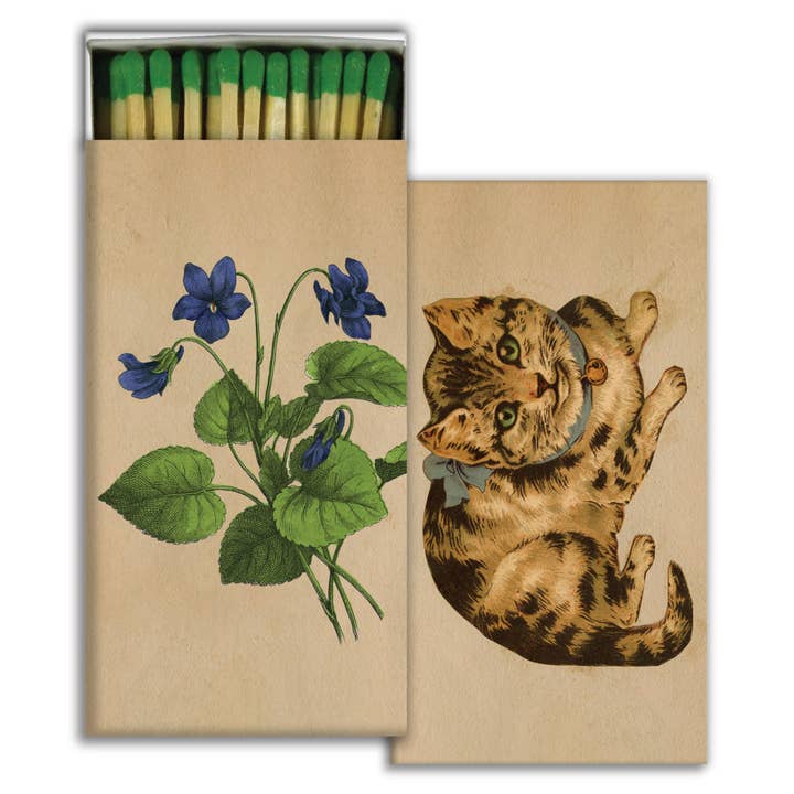Matches with a cat and flower design on the cover.