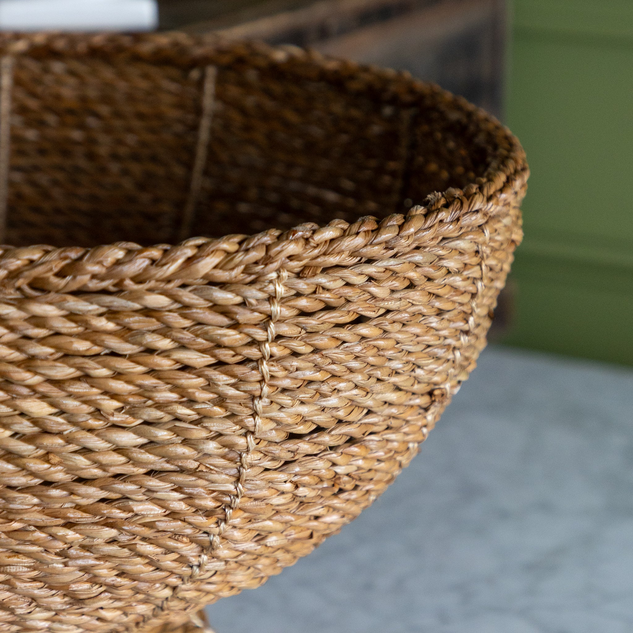 Close-up of a woven basket with a blurred background.