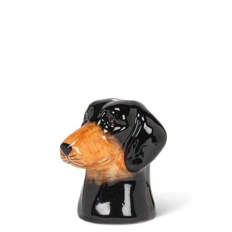 Dog-shaped black and brown ceramic vase on a white background.