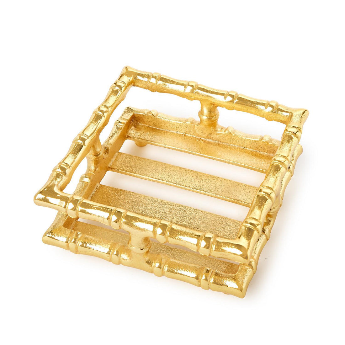 Gold bamboo-style cocktail napkin holder set on a white background.