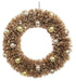 Decorative wreath with gold and silver ornaments on a white background.