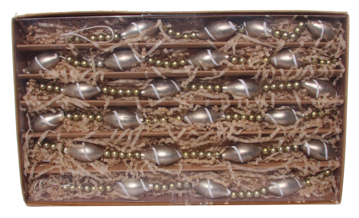 A holiday garland in a cardboard box.