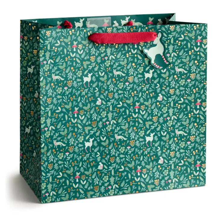 Gift bag with animal and floral pattern on a white background