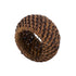 A brown woven rattan napkin ring, isolated on a solid white background.