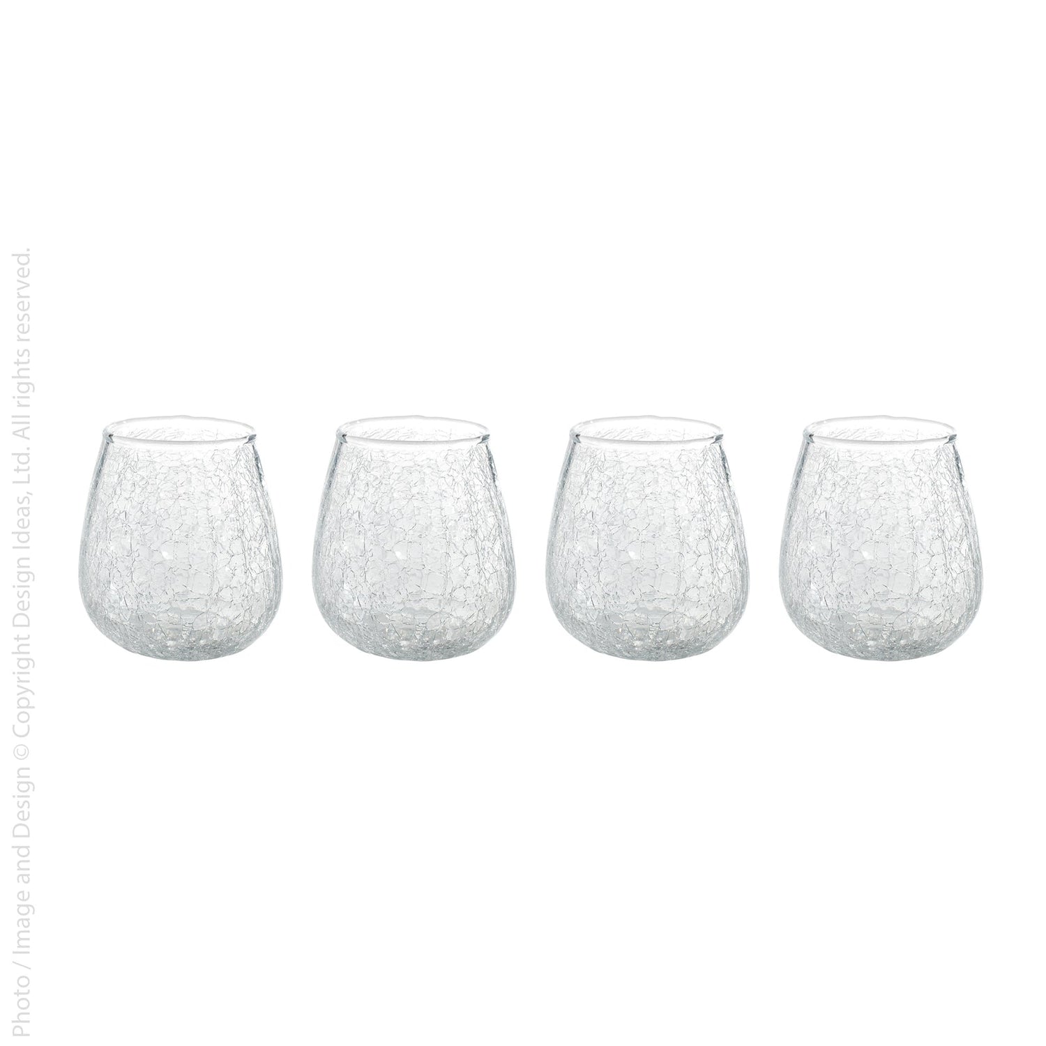 Four clear stemless drinking glasses with a textured crackle bubble pattern, arranged in a row on a white background.