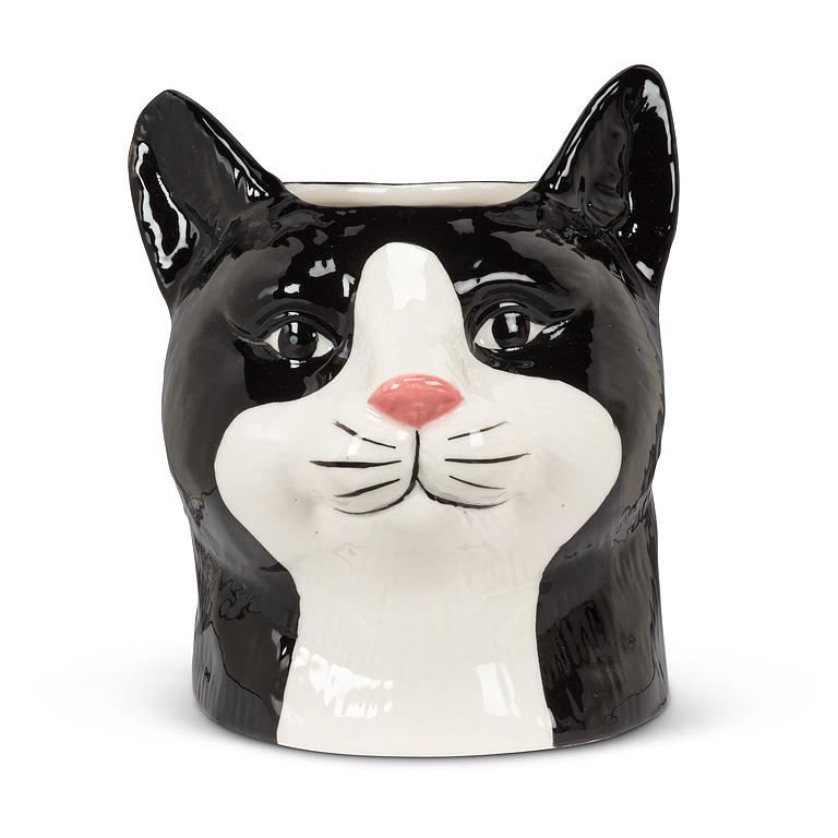 Cat-shaped planter in black and white on a white background