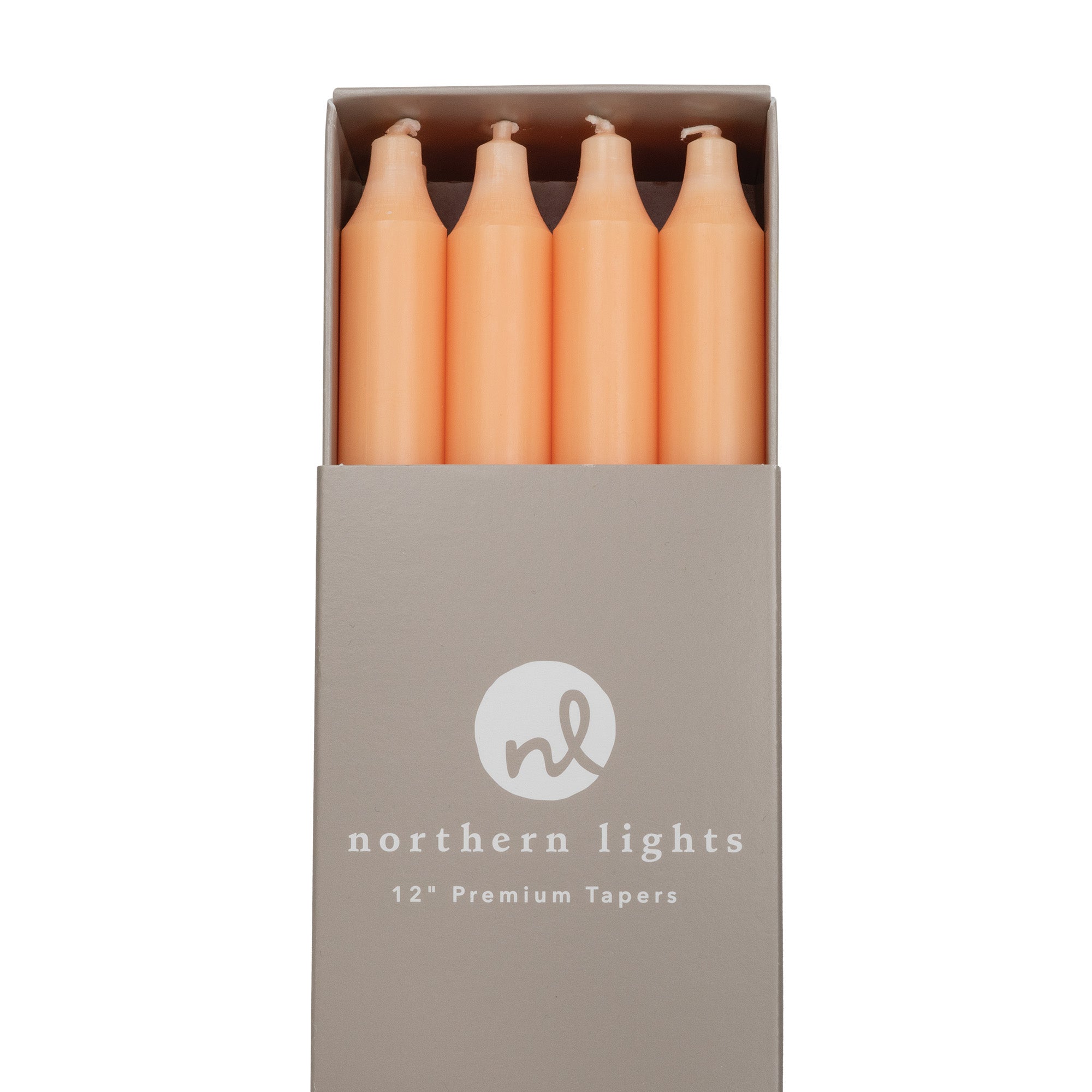 A box of Apricot 12&quot; premium smokeless dripless taper candles by Northern Lights.