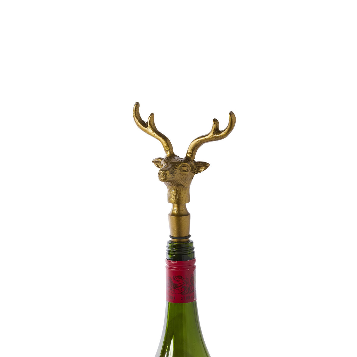 Brass deer head bottle stopper on a white background.