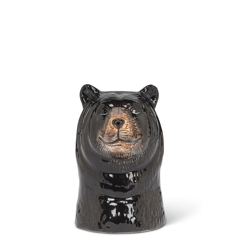 A glossy black ceramic bear-shaped container or candle holder with a detailed brown and beige snout and ears, set against a plain white background.