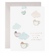 Front of card with illustration of babies in teacups floating from clouds saying "congrats on your new arrival!