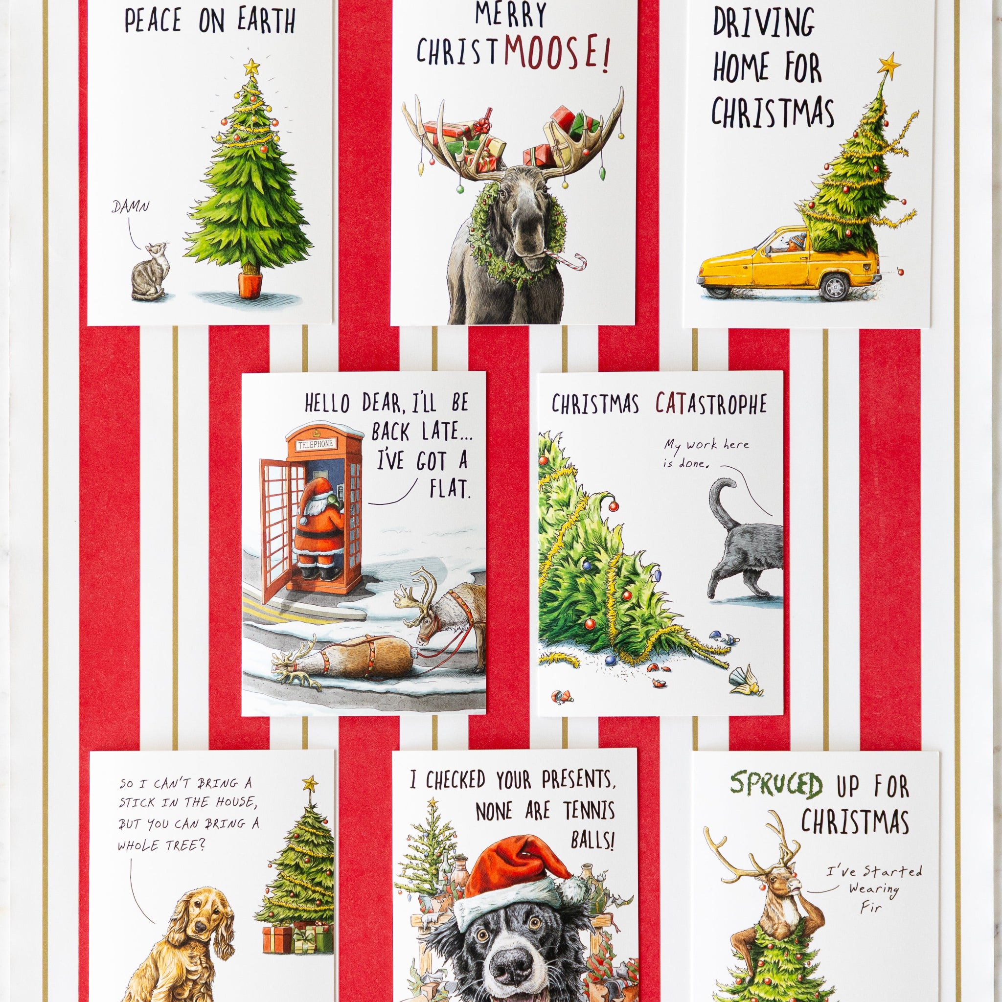 Bewilderbeest assorted Christmas cards on the Red &amp; Gold Awning Stripe Runner.