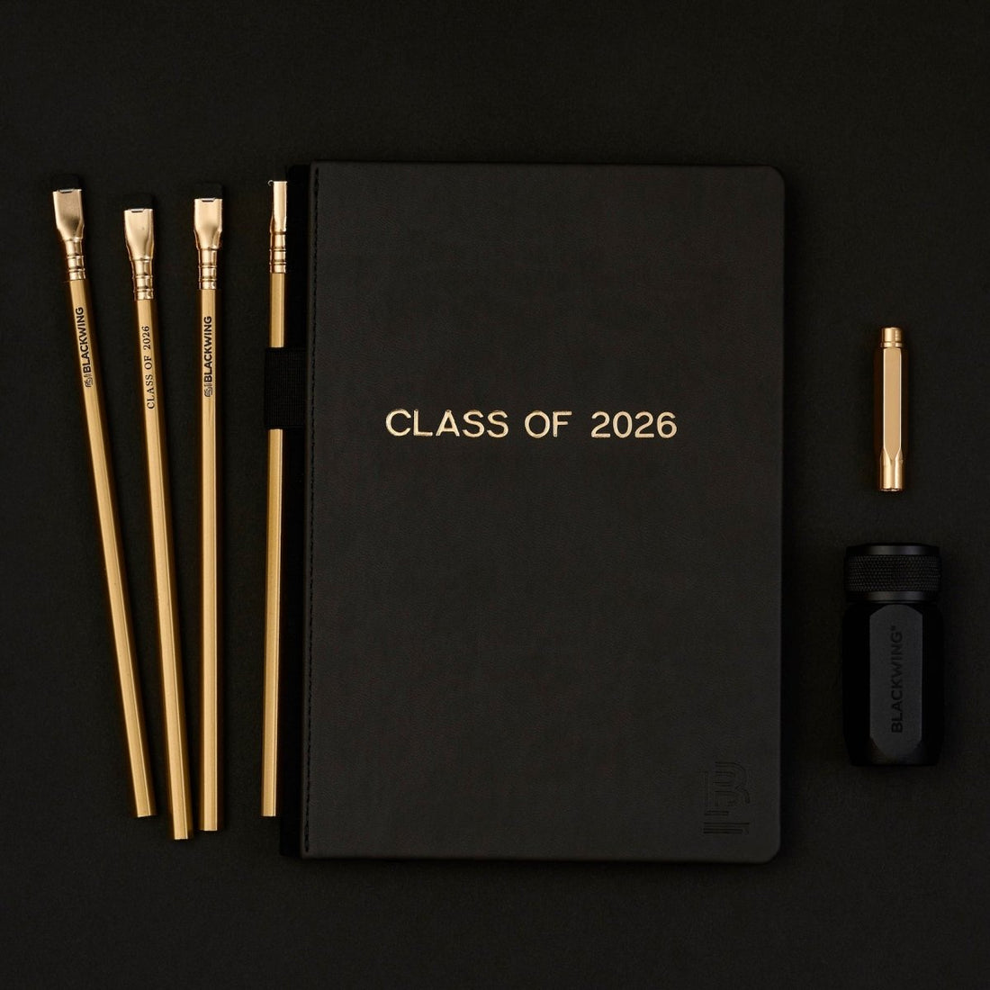 Black notebook with &