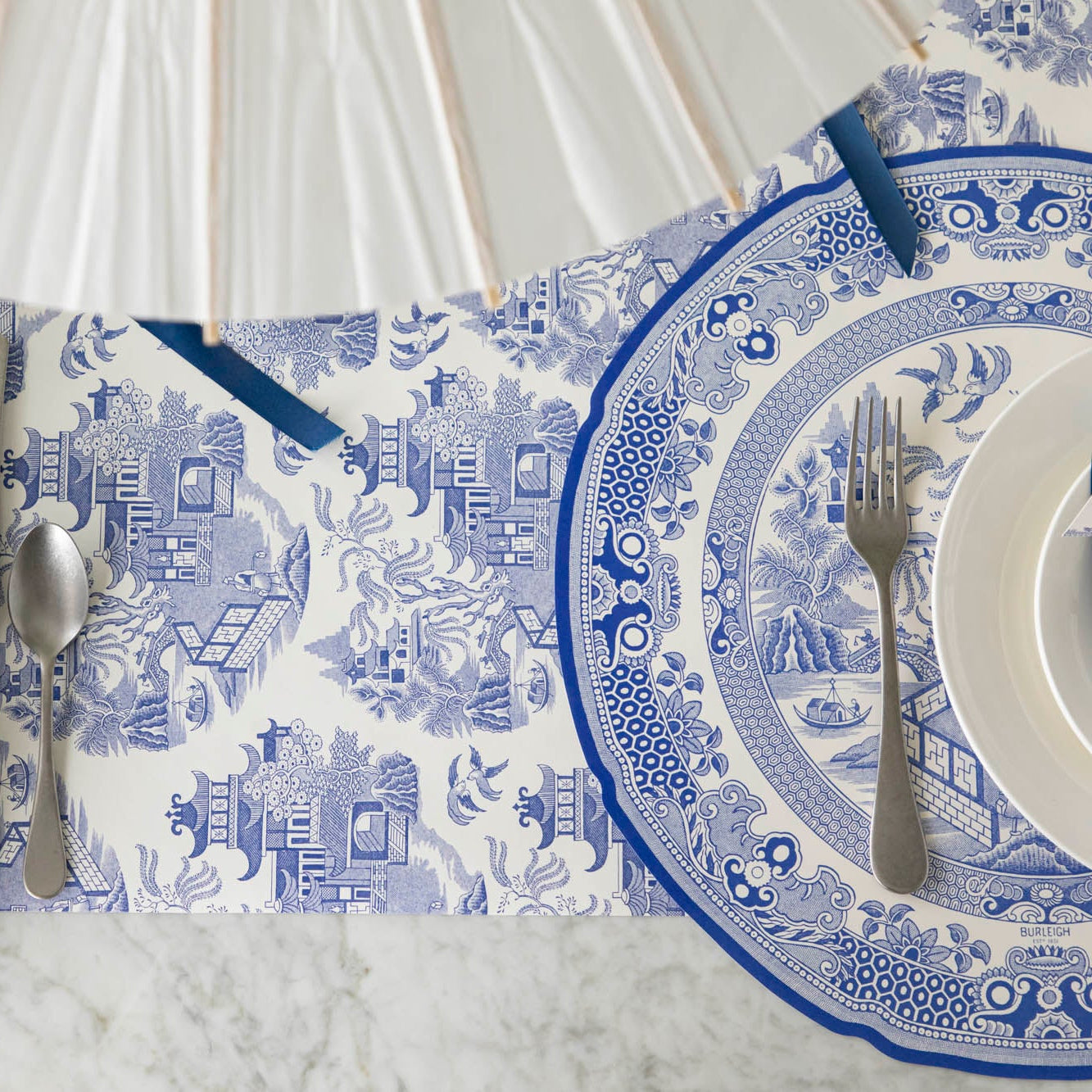 Die-cut Blue Willow Plate Placemat on top of the Blue Willow Runner.