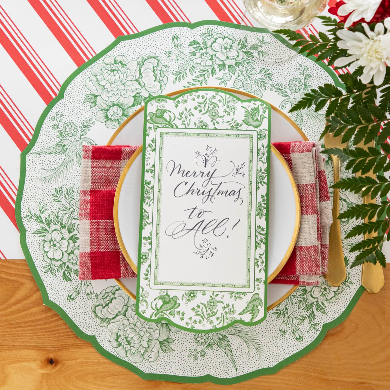 An elegant table setting featuring the Die-cut Green Asiatic Pheasants Placemat paired with the Green Asiatic Pheasants Table Card and Peppermint Stripe Runner underneath.