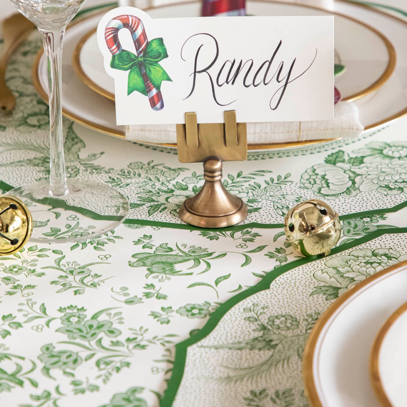 The Green Regal Peacock Runner paired under the Die-cut Green Asiatic Pheasants Placemat and Candy Cane Place card.