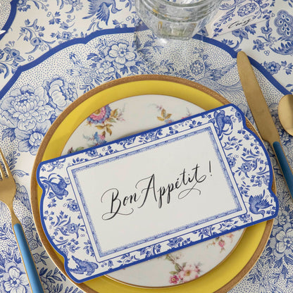 The Die-cut Blue Asiatic Pheasants Placemat in an elegant place setting.