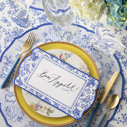 The Die-cut Blue Asiatic Pheasants Placemat in an elegant place setting.
