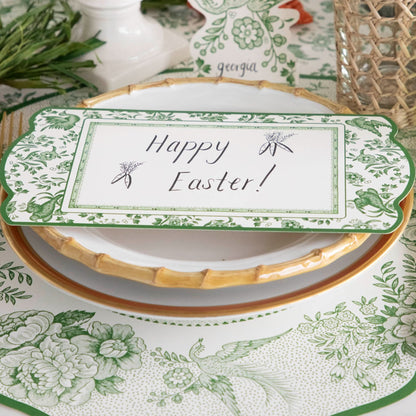 The Die-cut Green Asiatic Pheasants Placemat in an elegant Easter-themed place setting.