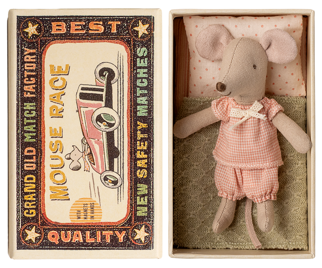 Stuffed mouse toy in a matchbox with vintage-style packaging.