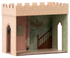 Cardboard castle model with interior details on a white background.