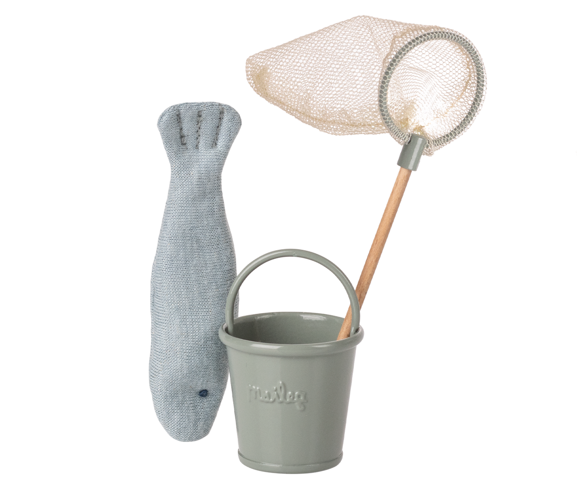 Gray toy fish, bucket, and net on a white background.