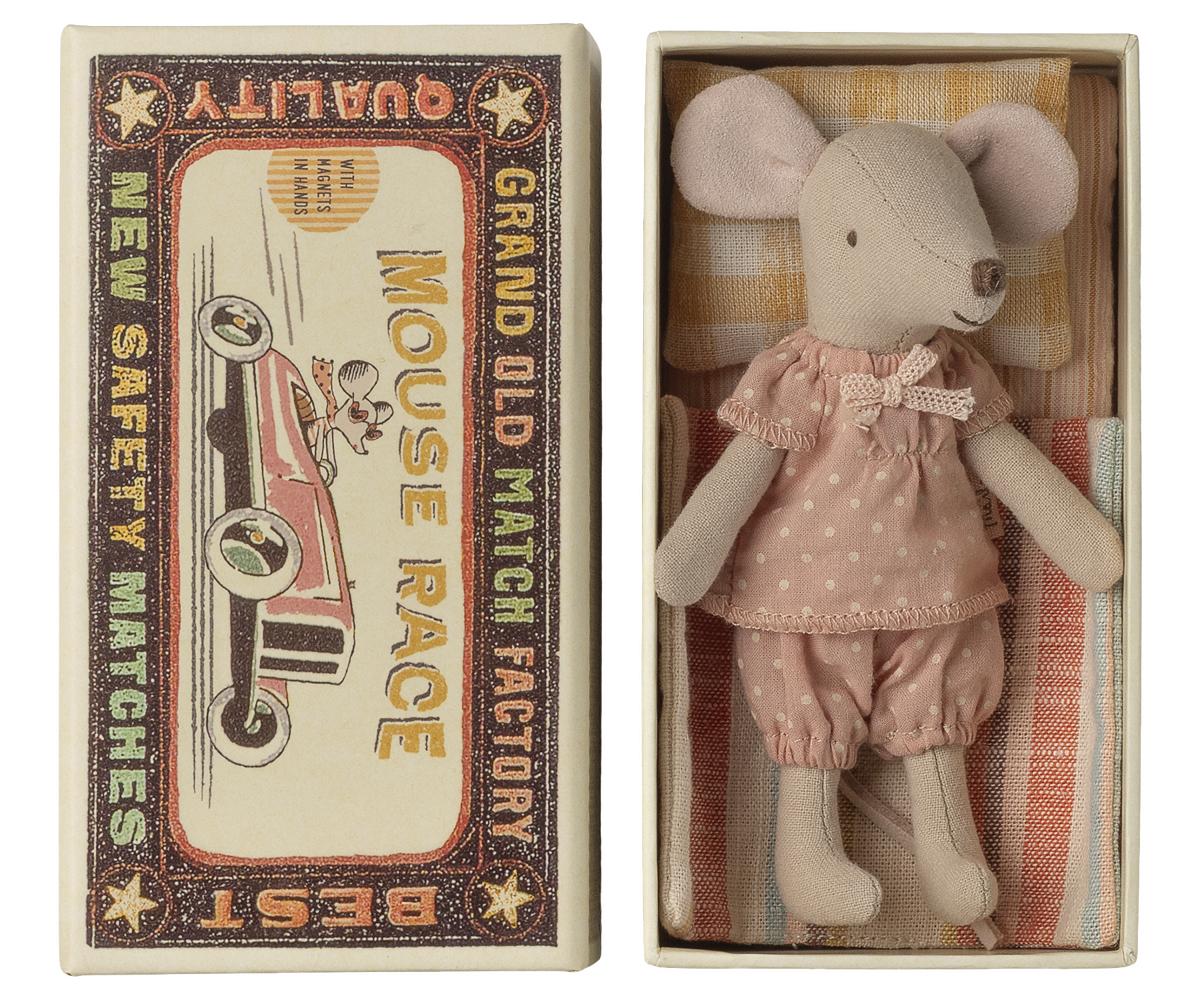 Stuffed mouse toy in a matchbox with an old-fashioned matchbox design.