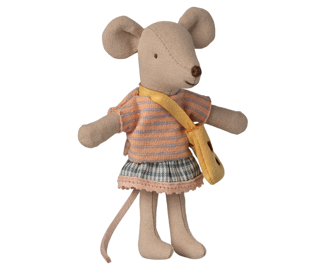 Stuffed mouse toy wearing a striped dress and yellow bag on a white background