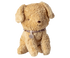 Beige plush puppy with a collar on a white background.
