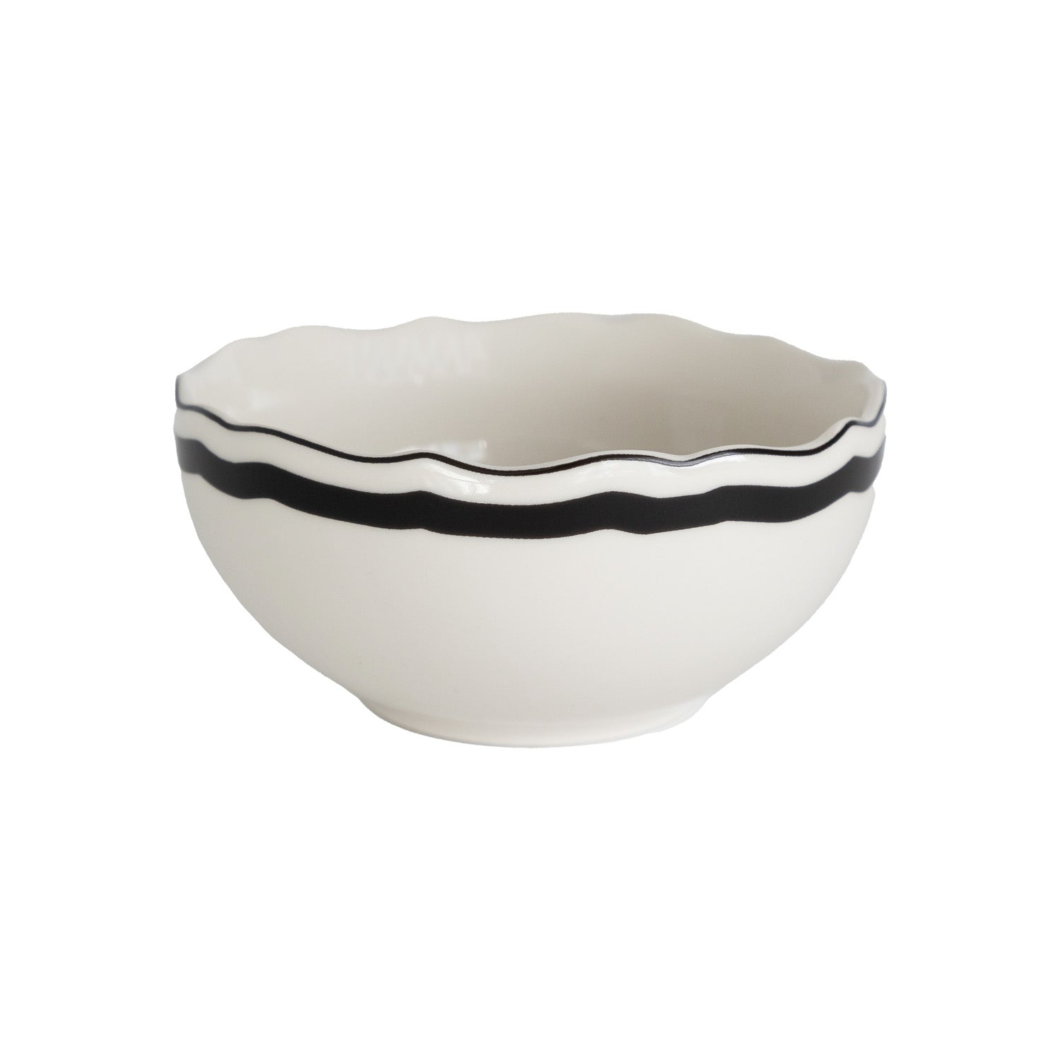 White mug with a black rim and scalloped edge on a white background.