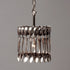 A hand-crafted Spoon Pendant Light made of vintage spoons hanging from a chain by Hester & Cook.