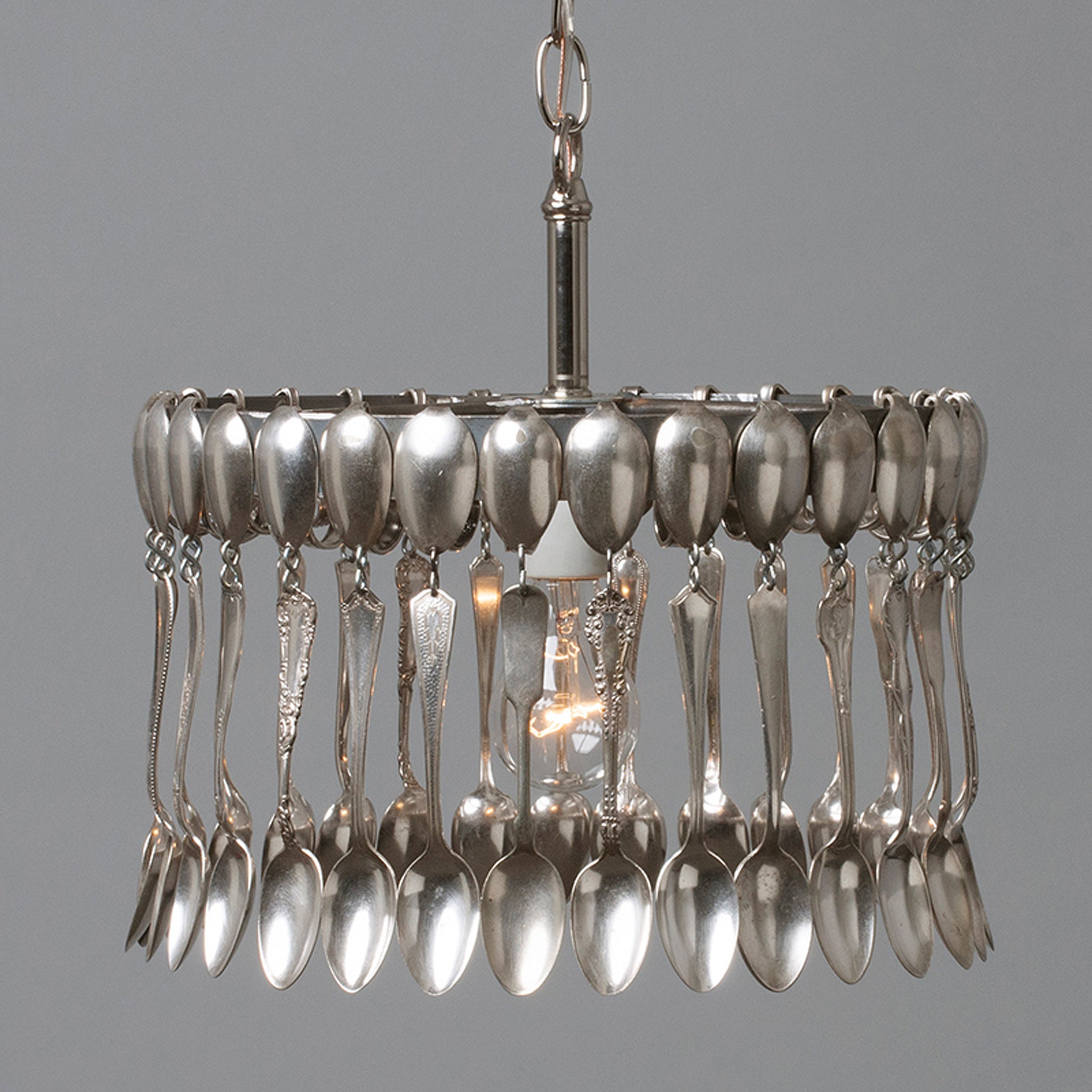 A hand-crafted Spoon Pendant Light made of vintage spoons hanging from a chain by Hester &amp; Cook.