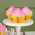 Honeycomb Small Cupcake Set of 3 on a cake pedestal, on a table.