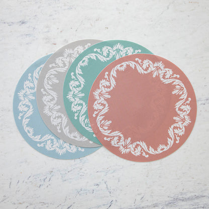 Scroll Round Placemat in four colors fanned out