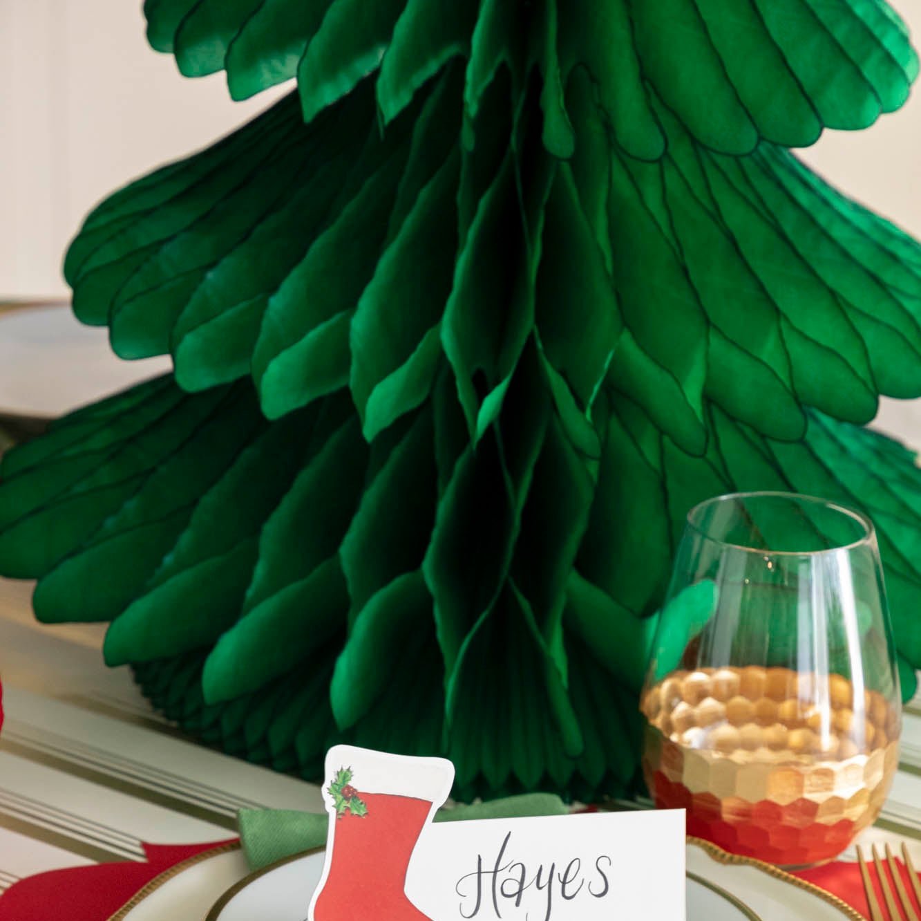 A close up of the Honeycomb Extra Large Tree behind a table setting.