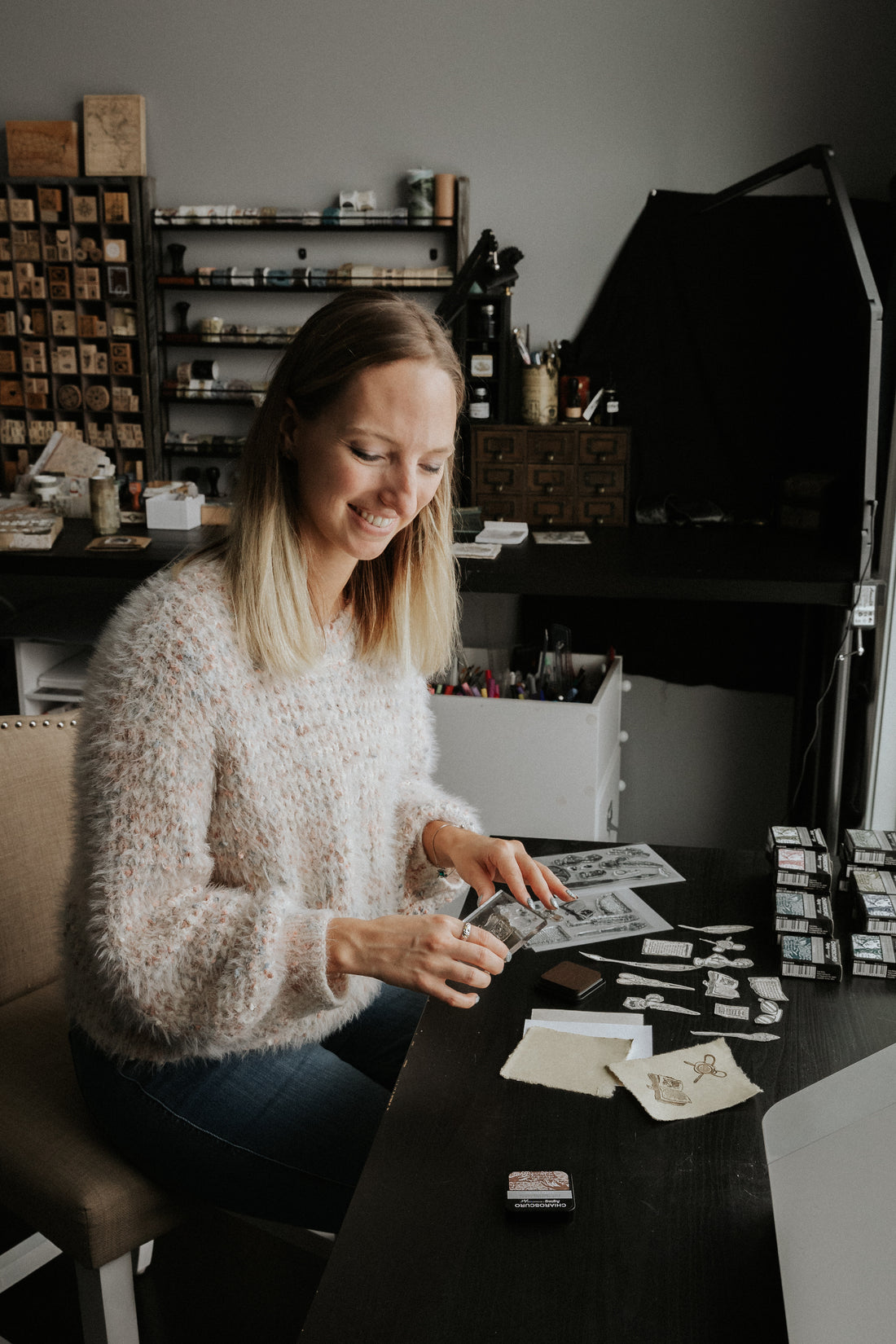 Cora Crea Crafts working at her desk. 