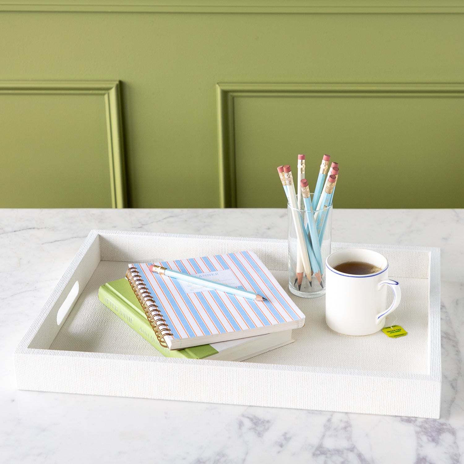 Silk Linen St. Tropez Decorative Tray with a book, planner, cup of tea and cup of pencils atop.