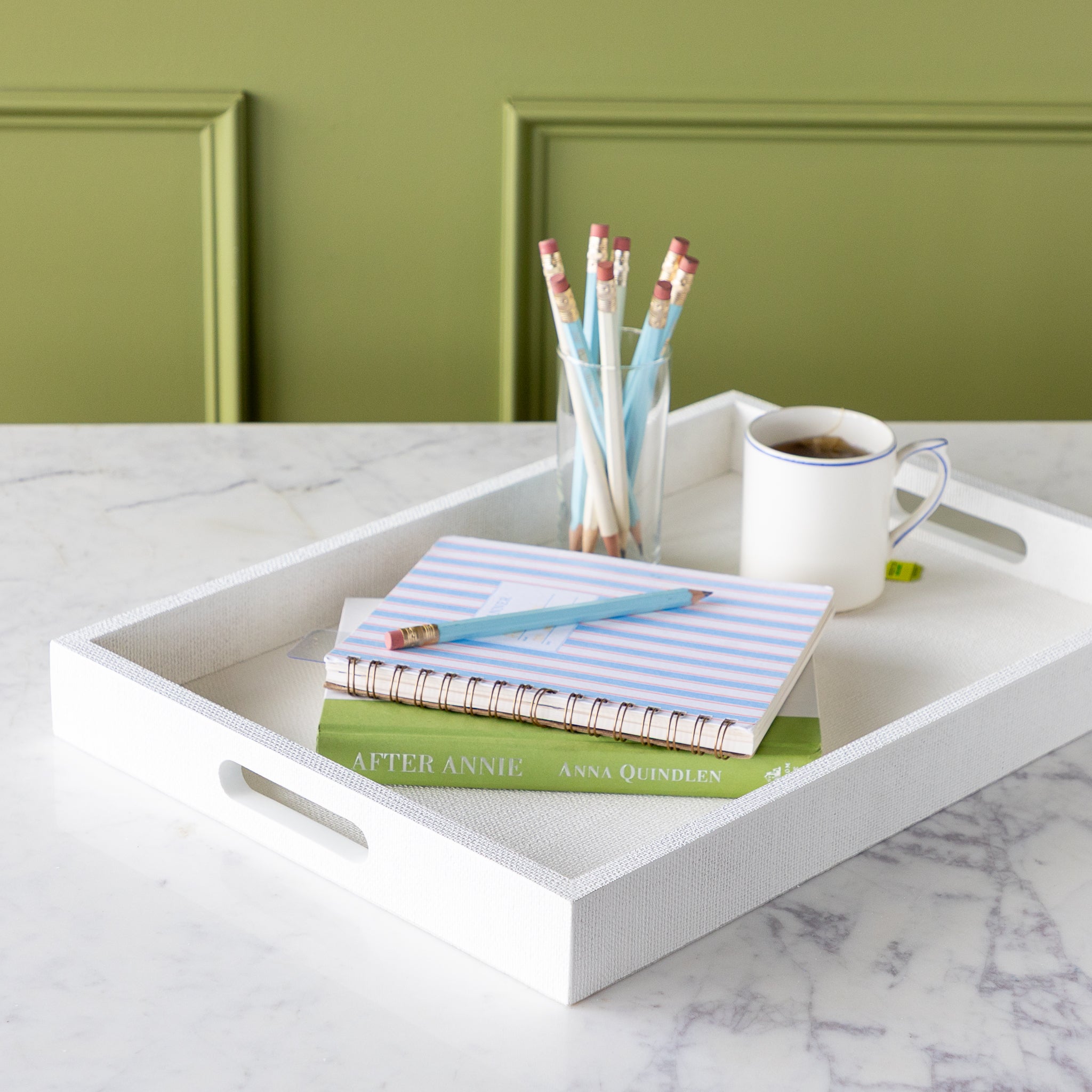 Silk Linen St. Tropez Decorative Tray with a book, planner, cup of tea and cup of pencils atop.