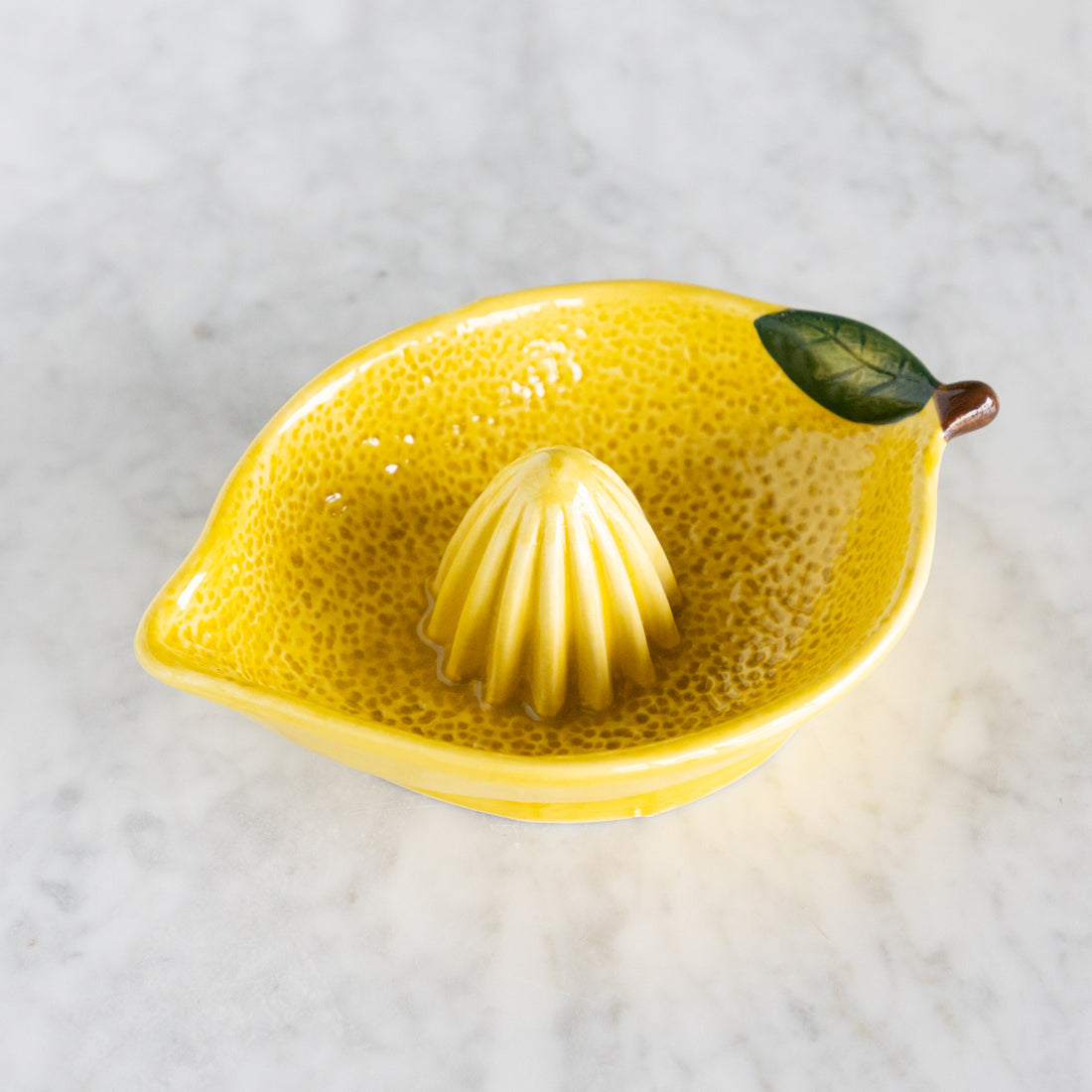 Lemon shaped juicer. 