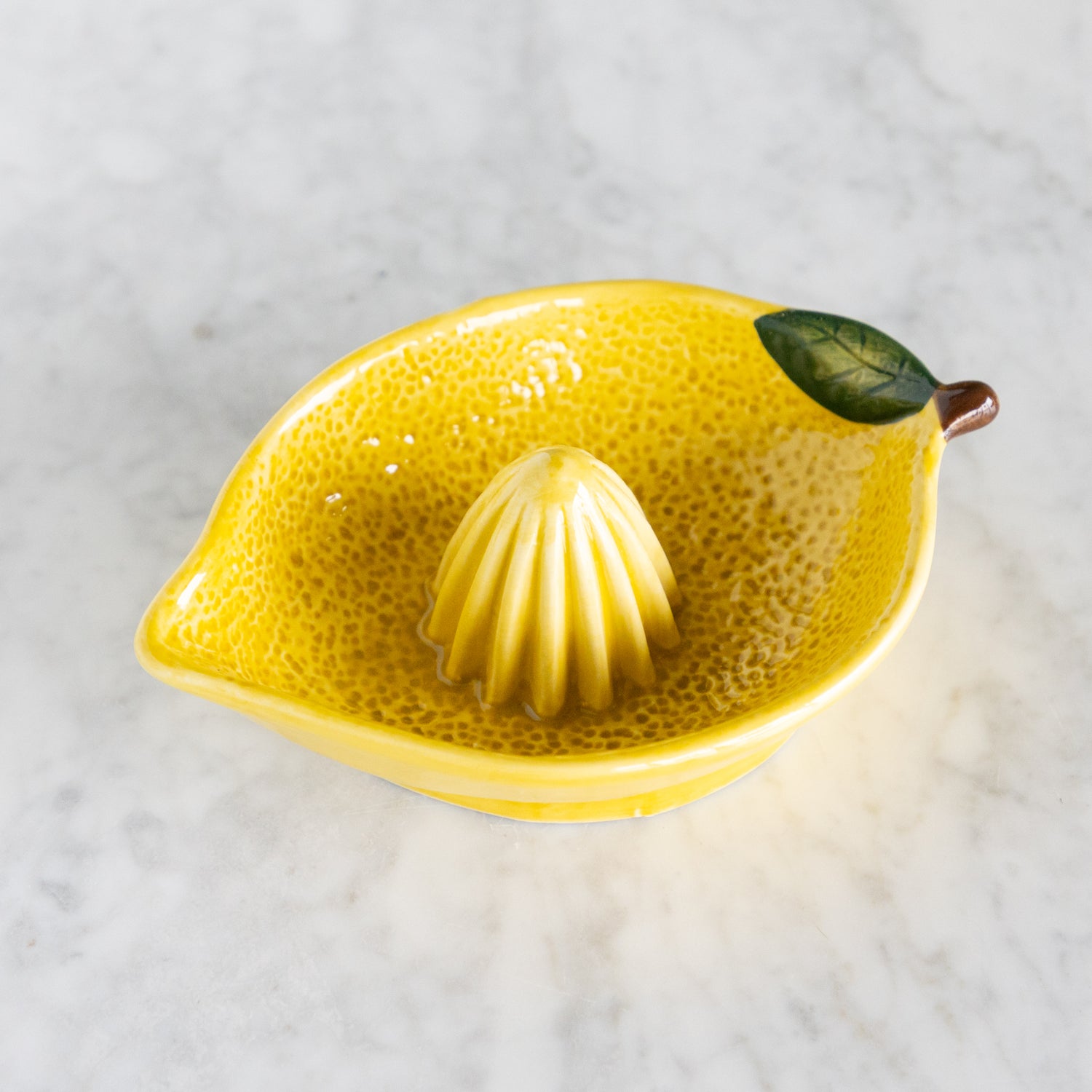 Lemon shaped juicer. 
