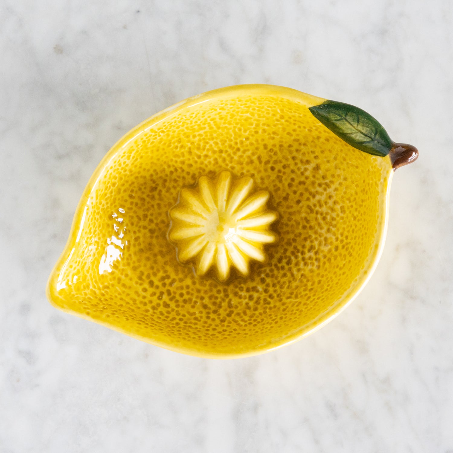 Overview of a lemon shaped juicer. 
