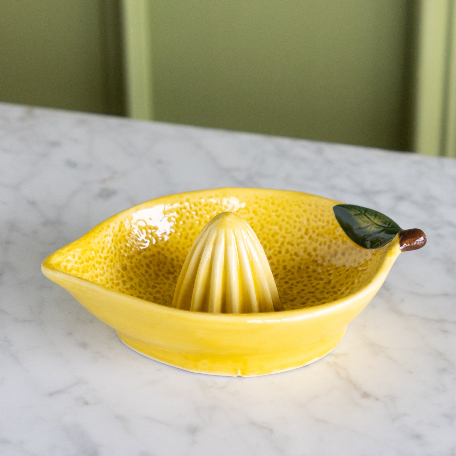 Lemon shaped juicer. 
