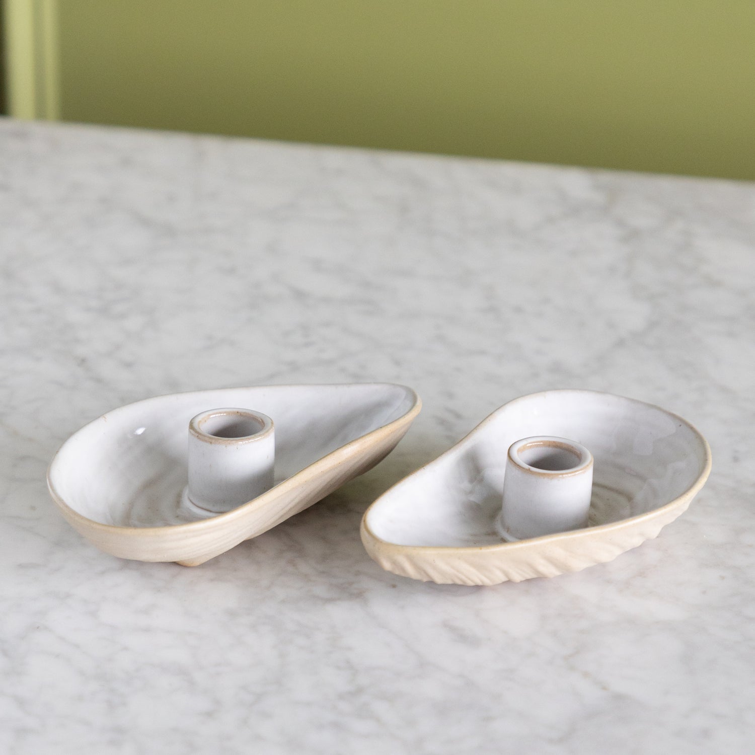 Two Oyster Shaped candle holders. 