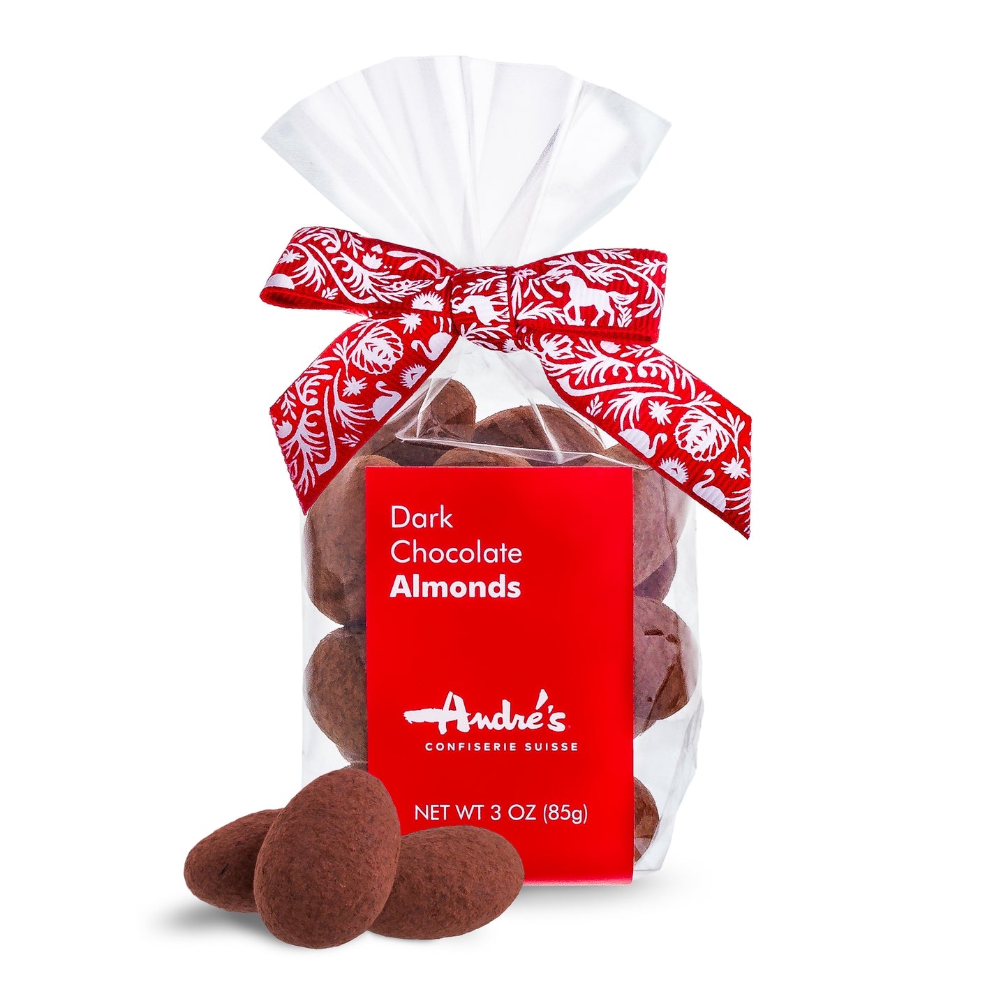 Packaged chocolate almonds with a red decorative bow on top of a transparent plastic bag labeled as &