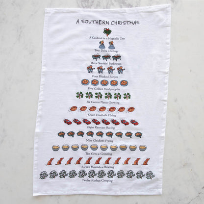 A Southern Christmas Print Kitchen Towel featuring the Twelve Days of Christmas in southern theme.