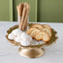 Scalloped Edge Cast Aluminum Cake Plate with the Gold Confetti Serving Paper, palmiers, meringues, and a small cup of wafers atop. 