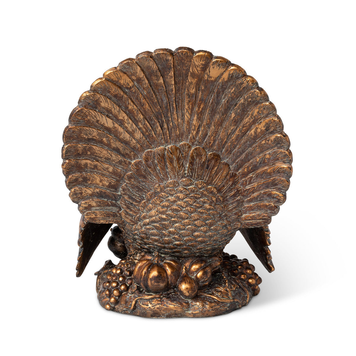 A back view of the Antique Bronze Turkey showing its detailed, fanned out tail fathers and pumpkins at its feet.