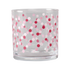 Clear glass candle holder with pink and red polka dots on a white background