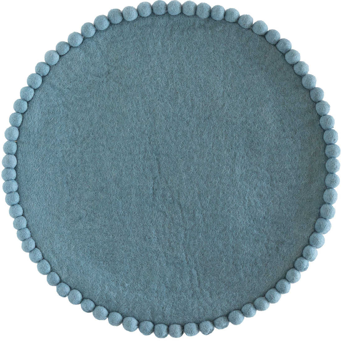 Cornflower Blue colored round felt placemat with small pom poms around the edge. 