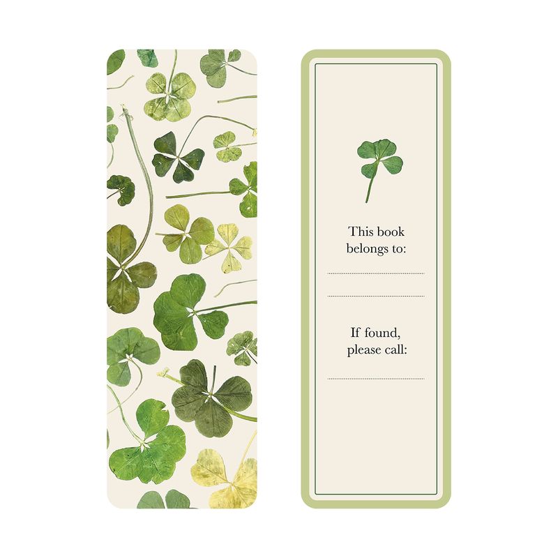 A bookmark with pressed clover design on one side and a place for personalization on the other. 