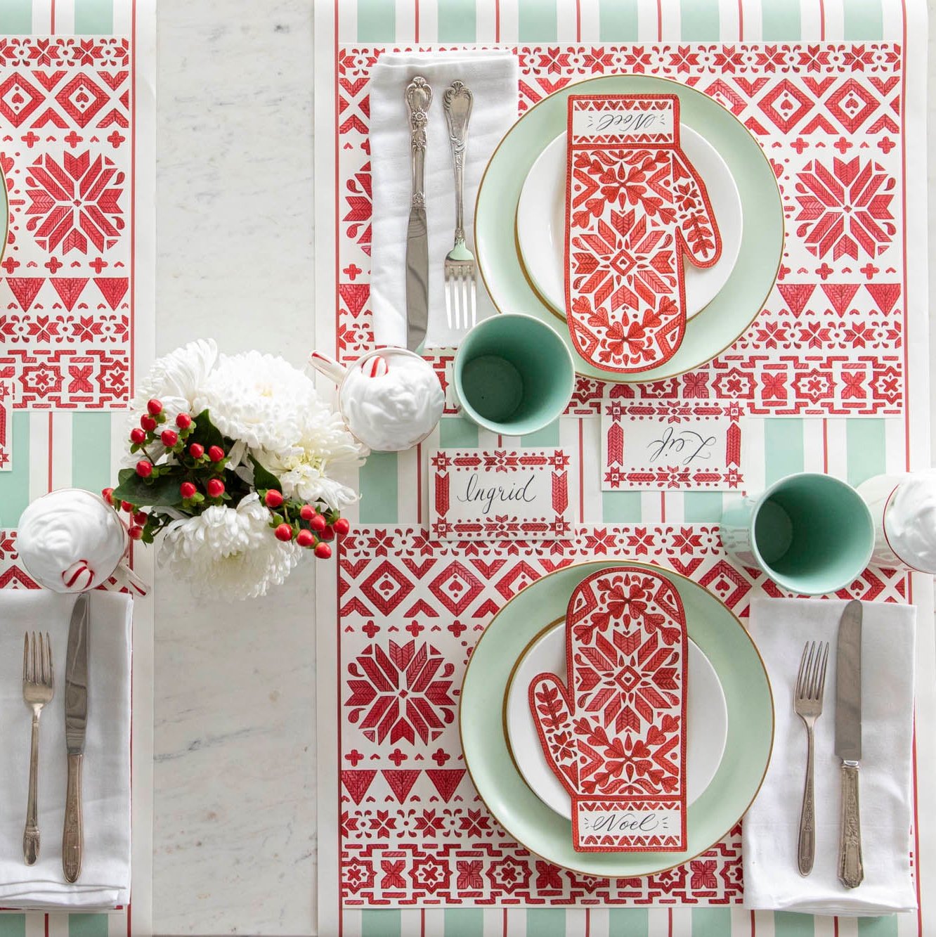 An elegant table setting with flowers, dinnerware and the Seafoam &amp; Red Awning Stripe Runner underneath the Fair Isle Placemat.